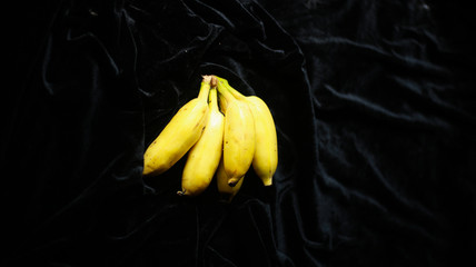 yellow Banana in a black background