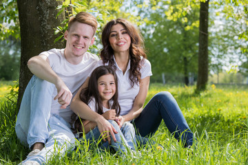 Family on park meadow