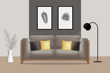 The cozy interior of the living room. Gray sofa with yellow and dark gray pillows