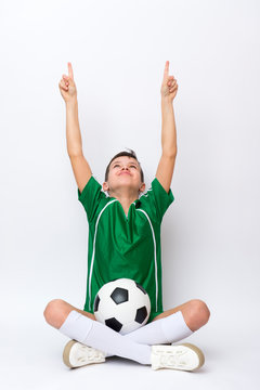 Kid Play With Soccer Ball Over White Background. Kid Activities.Training Game Concept.