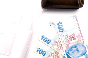 Fake Turkey Lira with wallet on white background. Lira have been worst impact by Covid-19 pandemic.