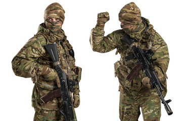 One soldier holding assault rifle. Uniform conforms to sub-unit of Russia's special forces Alpha Group FSB. Shot in studio. Isolated with clipping path on white background