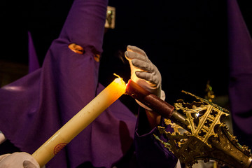 Nazarene lighting candle