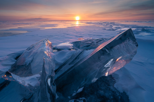 Baikal frozen lake in a morning sunrise view from Uzury bay, Siberia, Russia