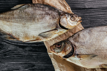 
fish on black wooden background