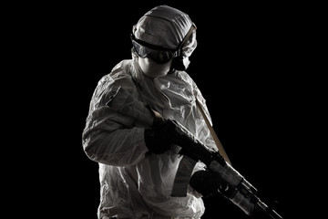 Male in russian mechanized infantry uniform (snow camouflage) on black background.