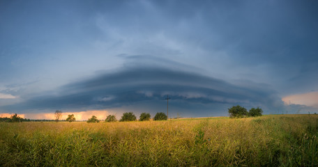 storm clouds over the field