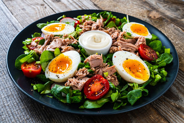 Tuna salad on wooden table
