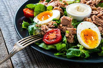 Tuna salad on wooden table
