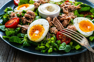 Tuna salad on wooden table
