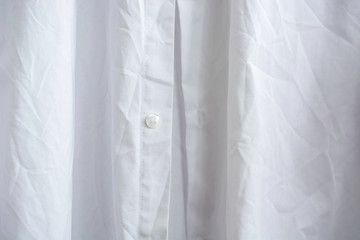 Close up wrinkled white classic long sleeve mens shirt