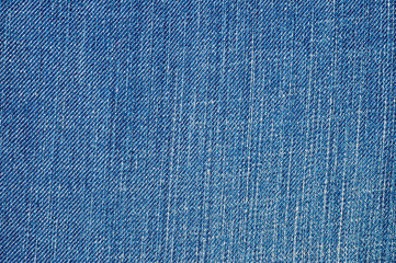 Close-up stretch denim. Background for the texture of outerwear and fashion.