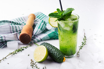 cucumber lemonade on a white wooden table