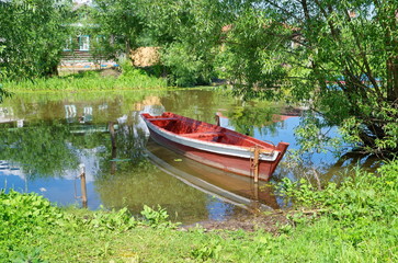 Pereslavl-Zalessky, Yaroslavl region. Boat at the Bank of the Trubezh river. Golden ring of Russia
