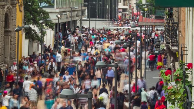 Crowd of people walking down a crowded street in Mexico timelapse