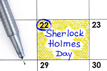 Reminder Sherlock Holmes Day in calendar with pen