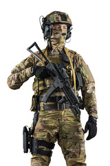 Soldier holding assault rifle. Uniform conforms to special services of the Russian Federation. Shot in studio. Isolated with clipping path on white background