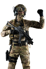 Soldier holding assault rifle. Uniform conforms to special services of the Russian Federation. Shot in studio. Isolated with clipping path on white background