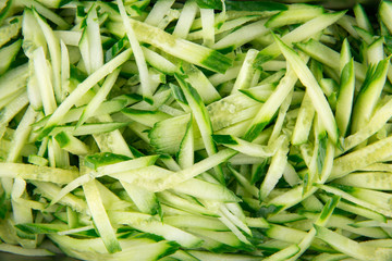 Closeup texture on green grated cucumbers