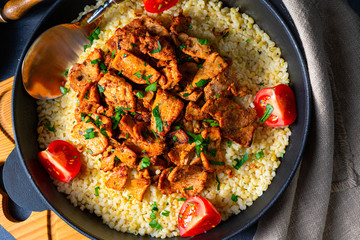 rustic bulgur pans with gratinated gyros and yoghurt