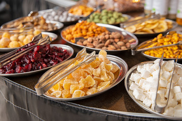 Oriental sweets. Dried fruit on the counter. The subject of food. Market and food sales