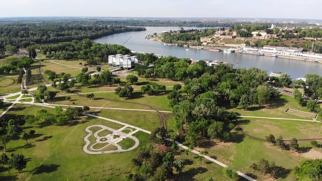 Fly over Usce park, a large public park near the confluence of Danube and Sava rivers in Belgrade, Serbia