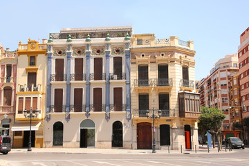 Fototapeta na wymiar Group of colourful historic modernist buildings, city of Castellón, Valencia, Spain.