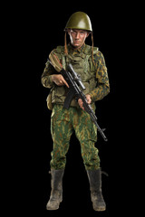 Male in uniform conforms to Russian army special forces (OMON) in War in Chechnya. Isolated on black backgroundx
