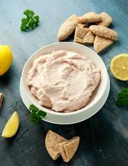 Taramasalata dip made with fish roe in white bowl