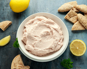 Taramasalata dip made with fish roe in white bowl