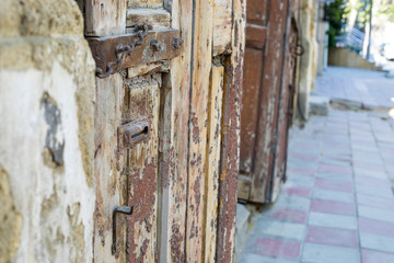 Vintage door in selective focus. Outdoor shot. Baku.