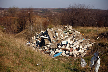 Closeup of a garbage dump, waste dumped. Concept about nature pollution.