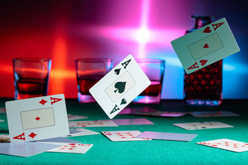 Cards fall on a casino table . Concept of gambling.