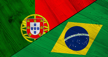 Flag of Portugal and Brazil on wooden boards