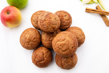 Apple Cinnamon Muffins with apples and cinnamon sticks