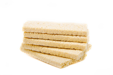 Loafs for weight loss. Crispbread for diabetics. Sugar-free bread. Dietary bread rolls on a white background. Bread rolls are stacked, heaped, . pyramid