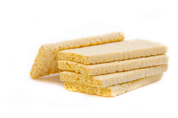 Loafs for weight loss. Crispbread for diabetics. Sugar-free bread. Dietary bread rolls on a white background. Bread rolls are stacked, heaped, . pyramid