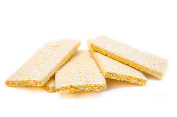 Loafs for weight loss. Crispbread for diabetics. Sugar-free bread. Dietary bread rolls on a white background. Bread rolls are stacked, heaped, . pyramid