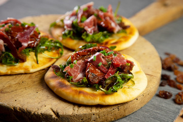 Mini Pizza with spanish ham in italy