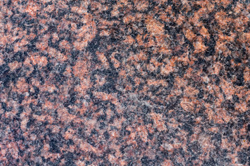 The stone is granite. Granite texture. Background image.