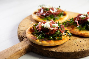 Mini Pizza with spanish ham in italy