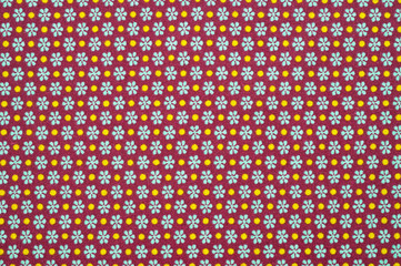 Close-up cotton lightweight fabric with a fine brown print. Background for the texture of outerwear and fashion.