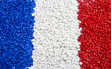 Blue,red,white plastic polymer granules 
