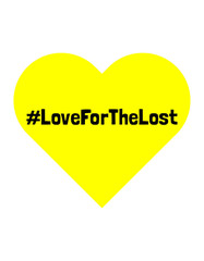 #Loveforthelost yellow heart during the coronavirus pandemic; yellow hearts in windows are being used to remember loved ones
