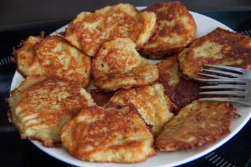 Top view of potato tortillas (draniki) on a plate.Close up.Selective focus