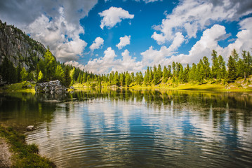 landscape with lake and mountains in the dolomites