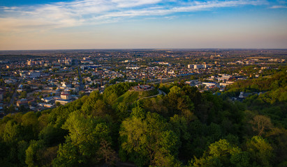 Fototapeta premium Aerial view on Union of Lublin Mound in High Castle Mountain in Lviv, Ukraine from drone