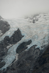 Aoraki, Mount Cook, mist closing in on the glacier. New Zealand 