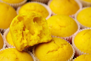 Half of yellow pumpkin muffin. Vegetable cupcakes, closeup. Homemade baker