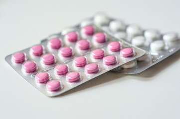 These Are Pink And White Pills In A Blister. Macro Photo. Medicine.